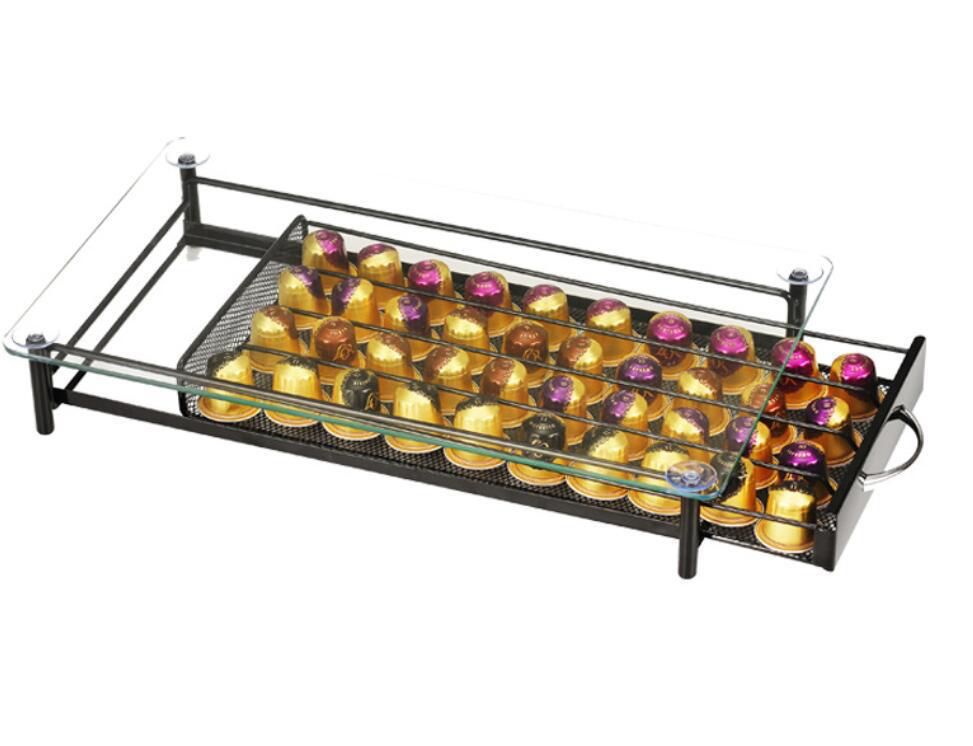 מתקן לאחסון קפסולות של מכונות אספרסו.
עם מגירה ומדף זכוכית.
ניתן להניח את המכונה עליו.