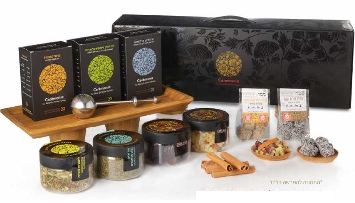 מארז שלדג - מארז המכיל:  
חולטן איכותי 100% נירוסטה. 
מארז 20 שקיקי פירמידה - ירוק נענע. 
מארז 20 שקיקי פירמידה - אינגליש ברקפסט.  
מארז 20 שקיקי פירמידה - קמומיל. 
תפזורת בצנצנת פלסטיק מהודרת - לימונענע. 
תפזורת בצנצנת פלסטיק מהודרת - מנטה. 
תפזורת בצנצנת פלסטיק מהודרת - ירוק לימונית.
תמרים בצנצנת פלסטיק מהודרת 200 גרם. 
כדורי חמאת בוטנים ושוקולד כ 55 גרם. 
עוגיות שוקולד צ